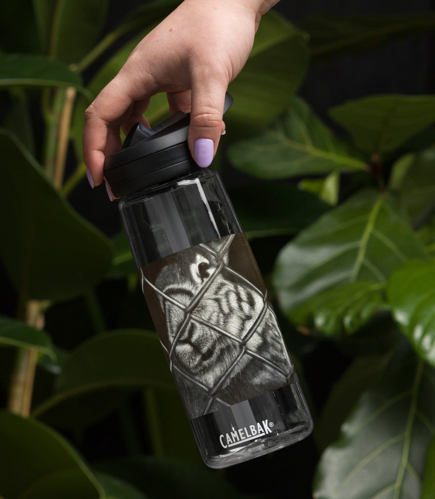 Grass is Greener: Black and White Bunny Design Sports Water Bottle